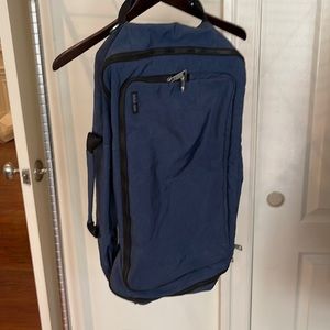Jack Spade backpack duffel bag in blue nylon. Side and top handles. 22” by 14”